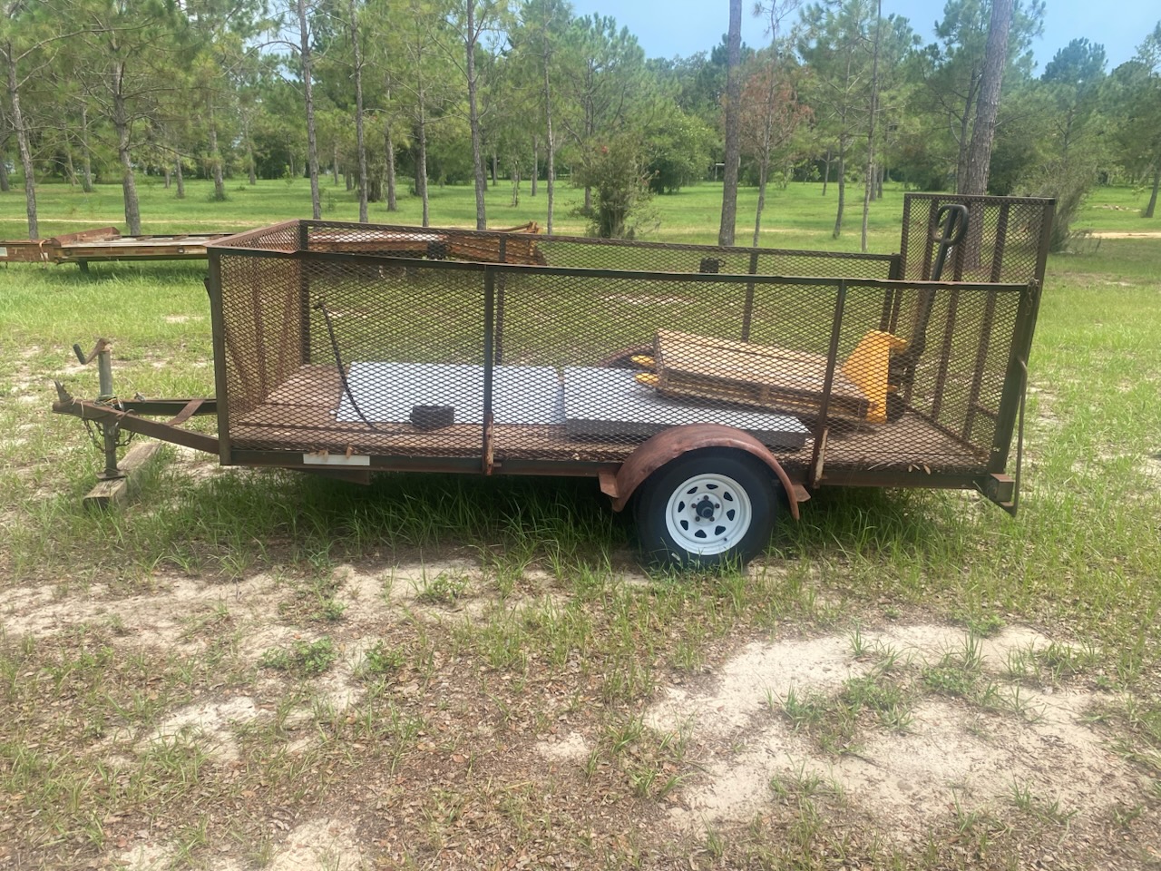 Clark's Junk Removal trailer ready for furniture, appliance, and household junk hauling in Central Florida